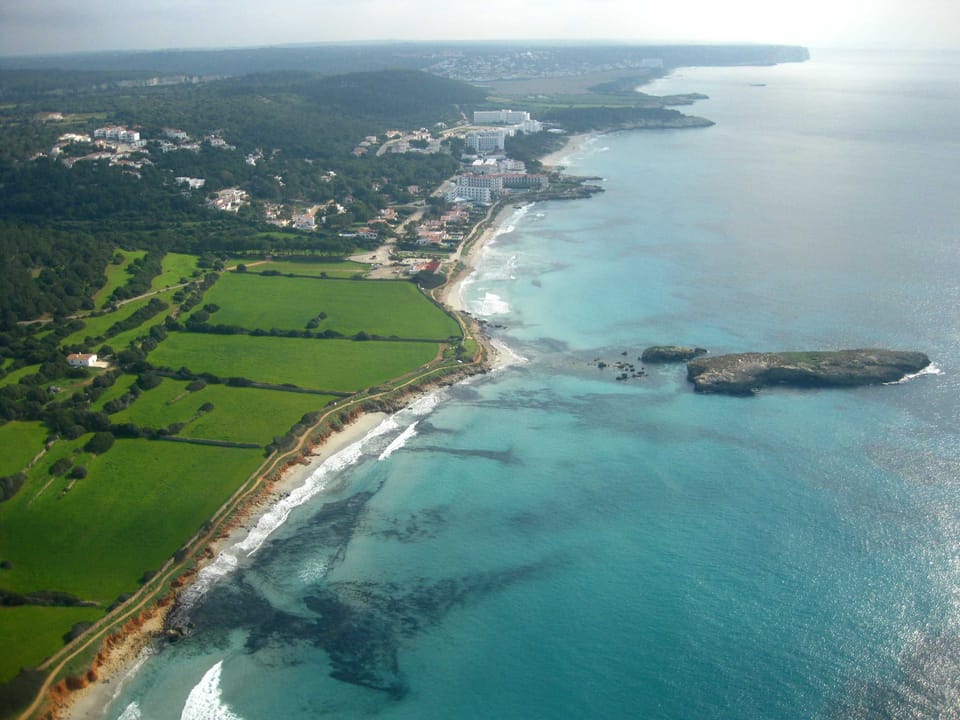 Santo Tomas beach and island.  Great for adventurous snorkelers and sunbathers