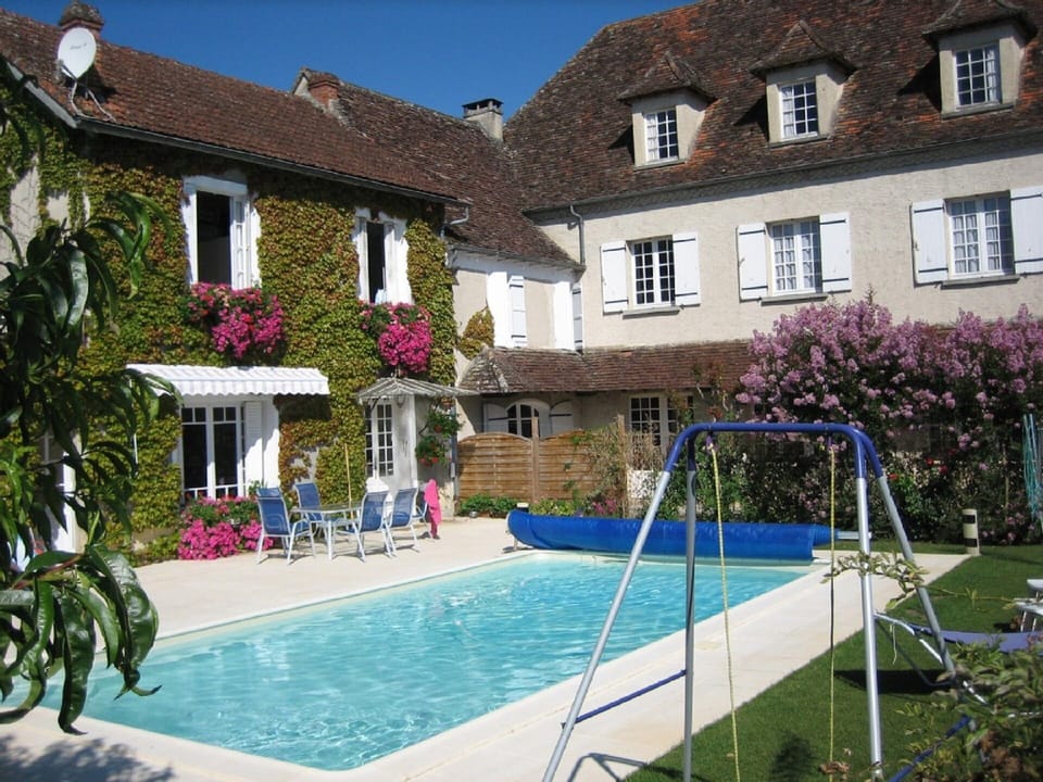 Outdoor Pool with sunbathing area