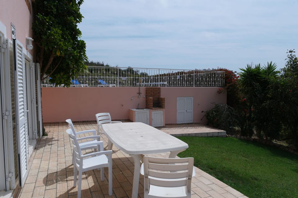 Lower terrace outside games room + 2nd BBQ