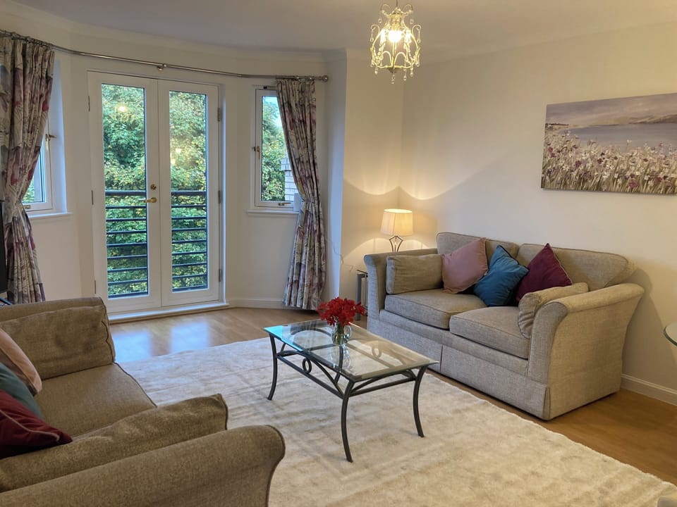 Spacious dining lounge with views over Edinburgh Skyline during Winter months.