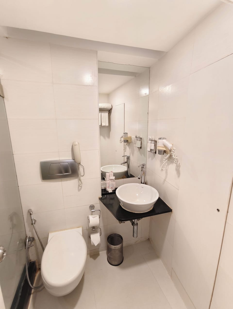 Shower, free toiletries, slippers, towels