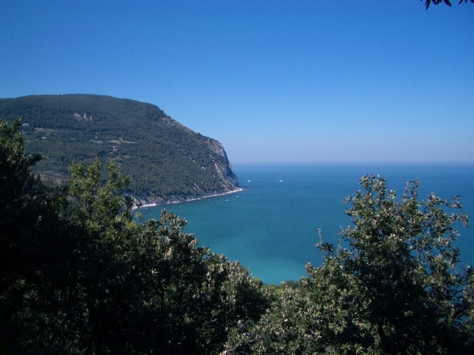 Exquisite beaches of Sirolo are just an hour away