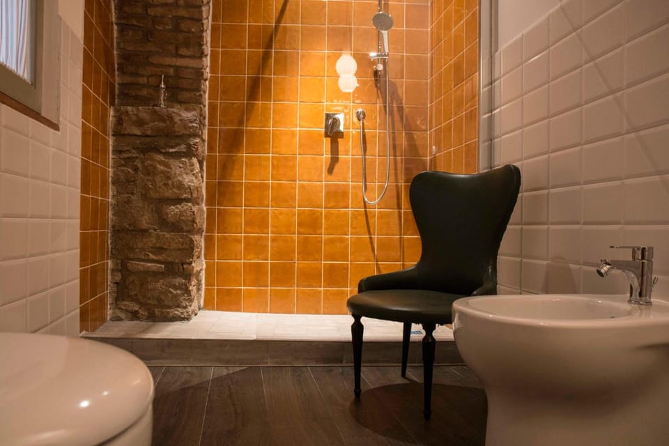 Shower, rainfall showerhead, towels