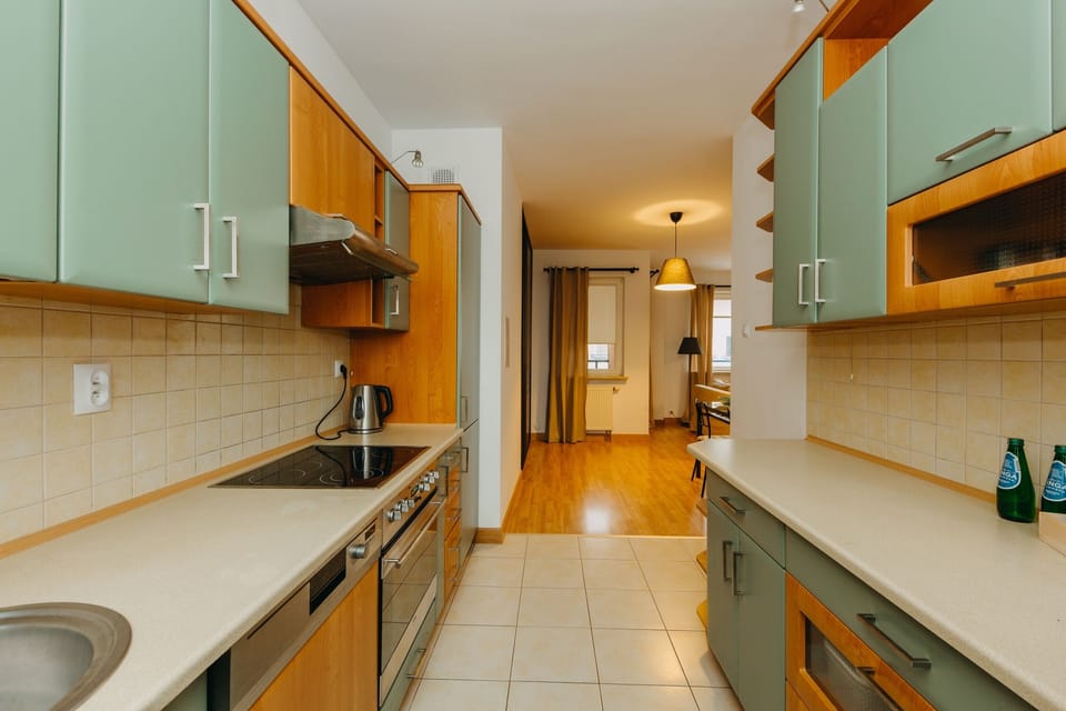 Comfort Apartment, Multiple Beds, Non Smoking, Courtyard View | Private kitchen | Coffee/tea maker, full-size fridge, microwave, oven