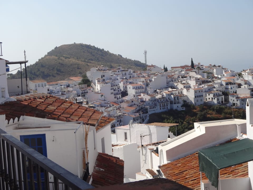 View over sea and mountains from roof terrace