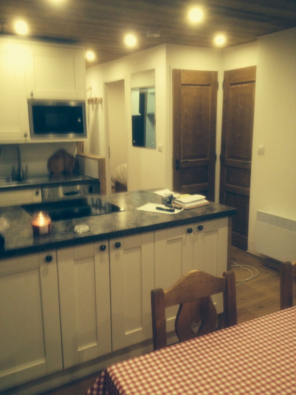The kitchen with microwave, oven, fridge, dishwasher. Very compact. All mod cons