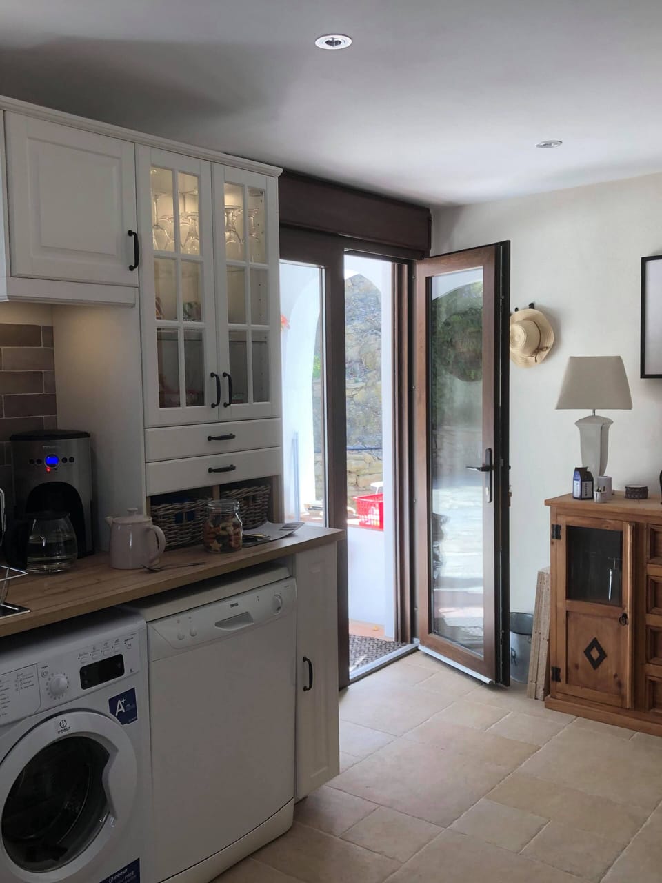 French doors from kitchen to back garden terrace