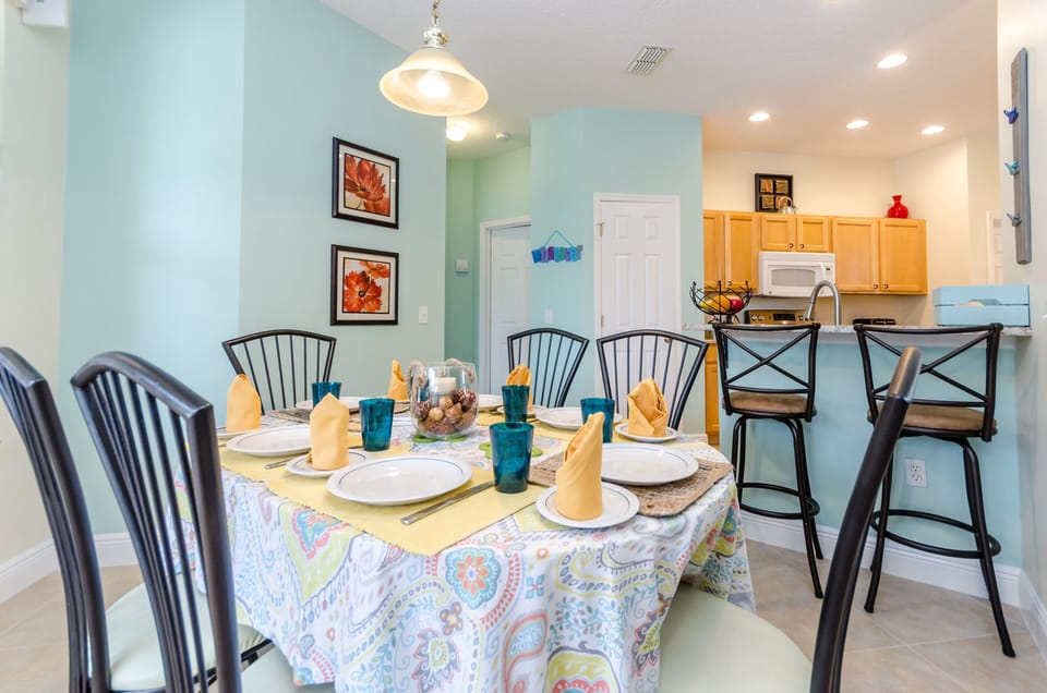 Convenient and sociable dining area and breakfast bar next to the kitchen