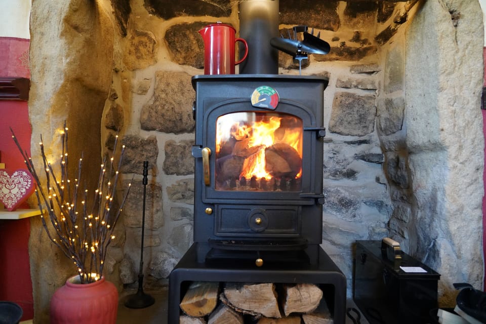 Have a coffee by the Log Burner.