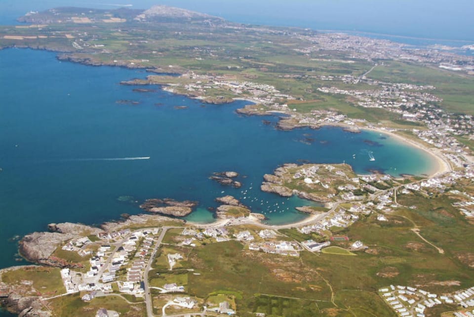 Aerial view of Trearddur Bay and the spectacular rocky coastline