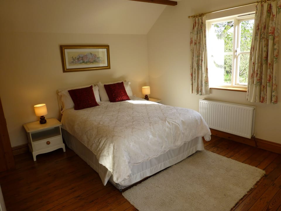 The master bedroom in Cherry Tree cottage.