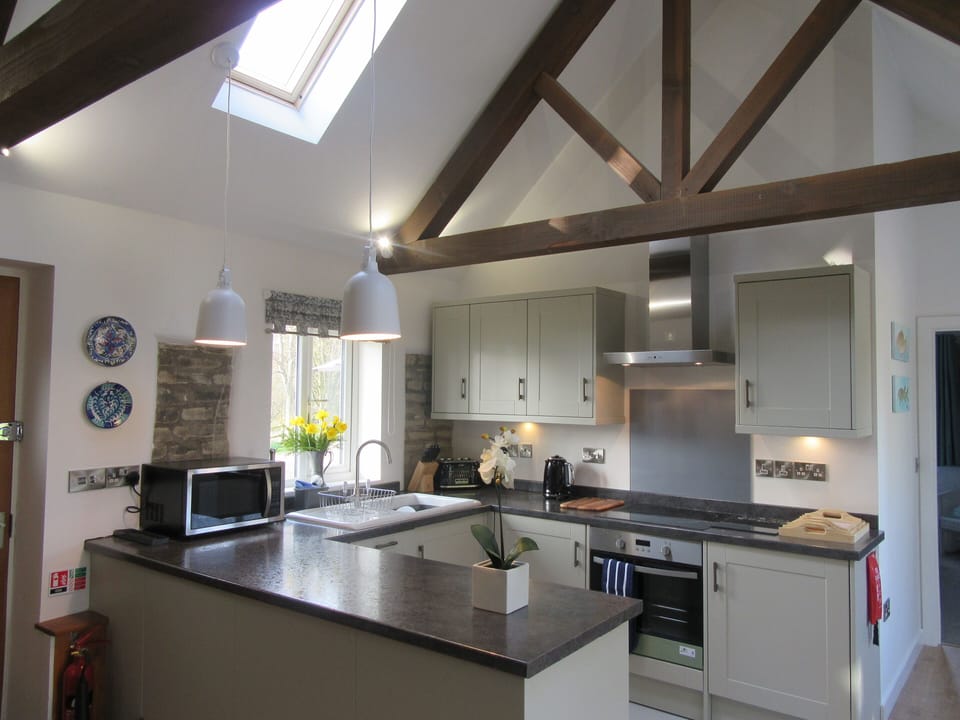 Kitchen.
To the right of the kitchen is the access to bedroom 1.
