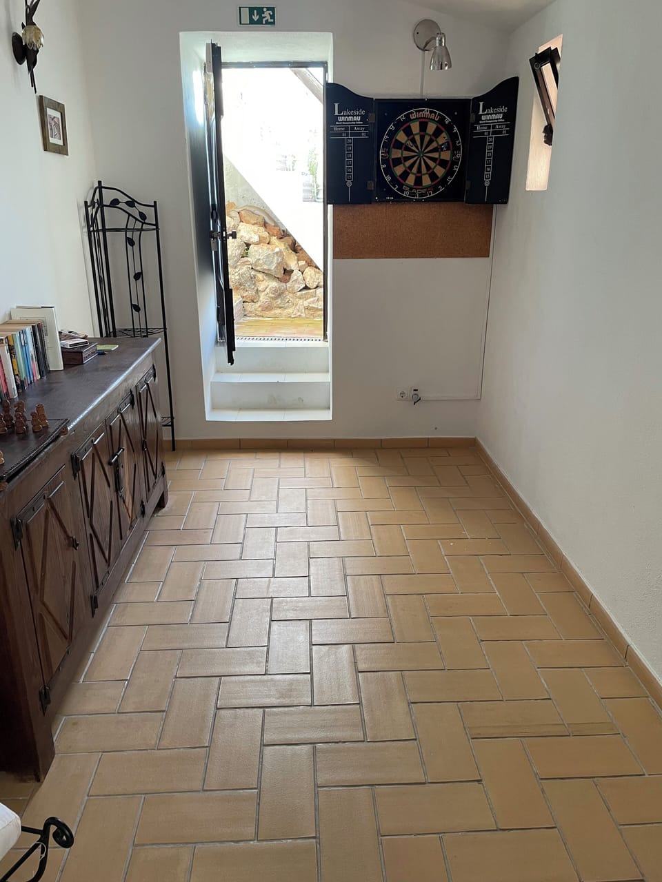 Games Room with darts, board games, Door to shower & WC, Up steps to Pool