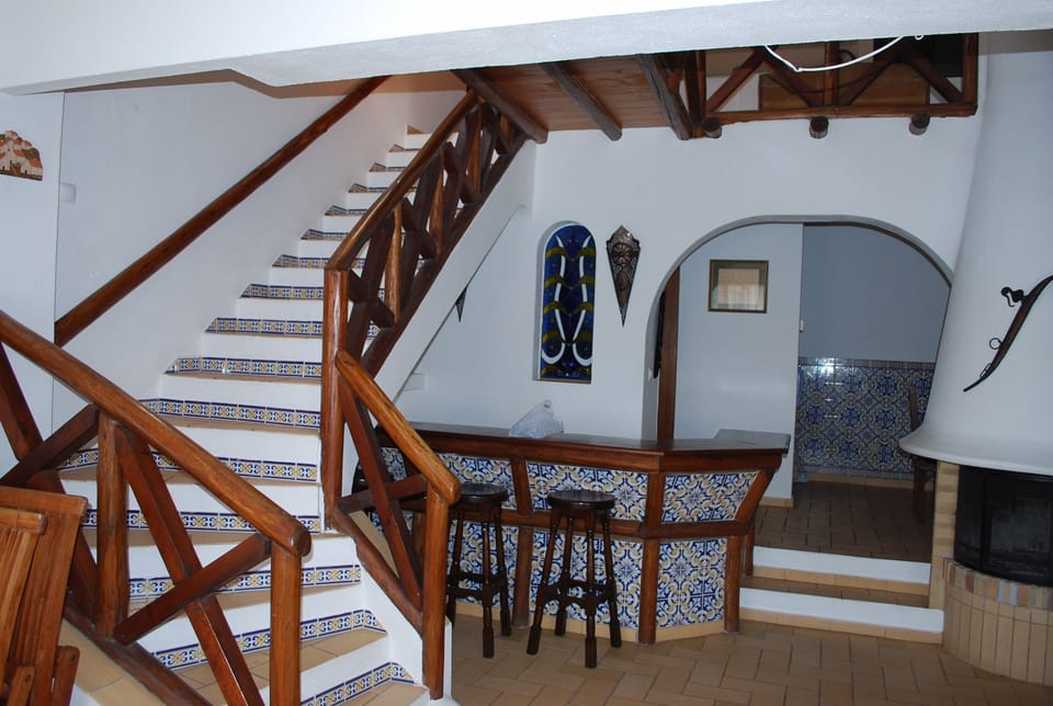 Main Lounge with Stairs to bedroom 1 & 2 and the  sun terrace .