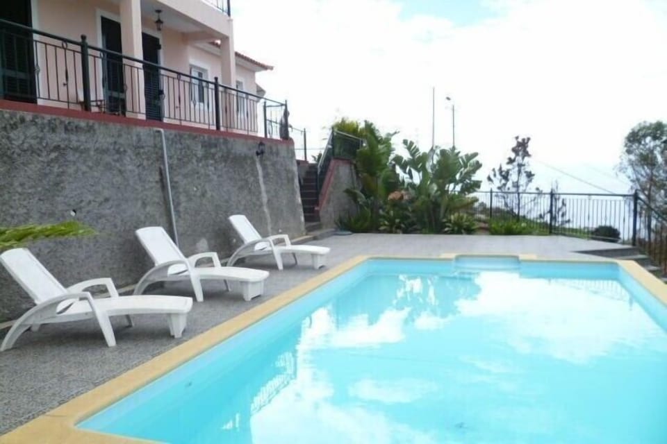 Large private heated swimming pool
