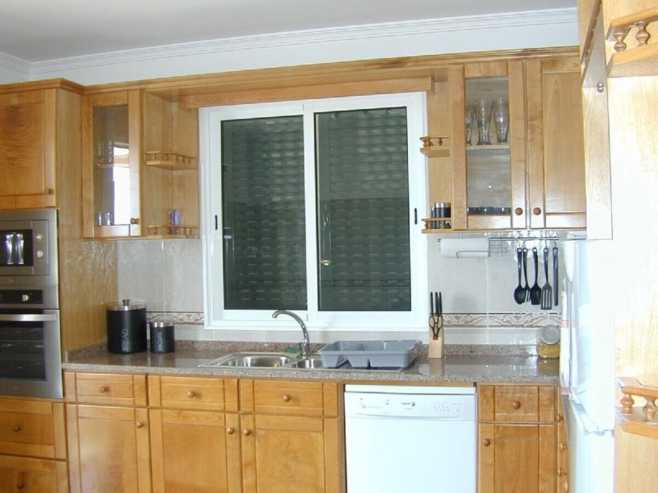 Fitted Kitchen double doors to terrace, sea and mountain views.
