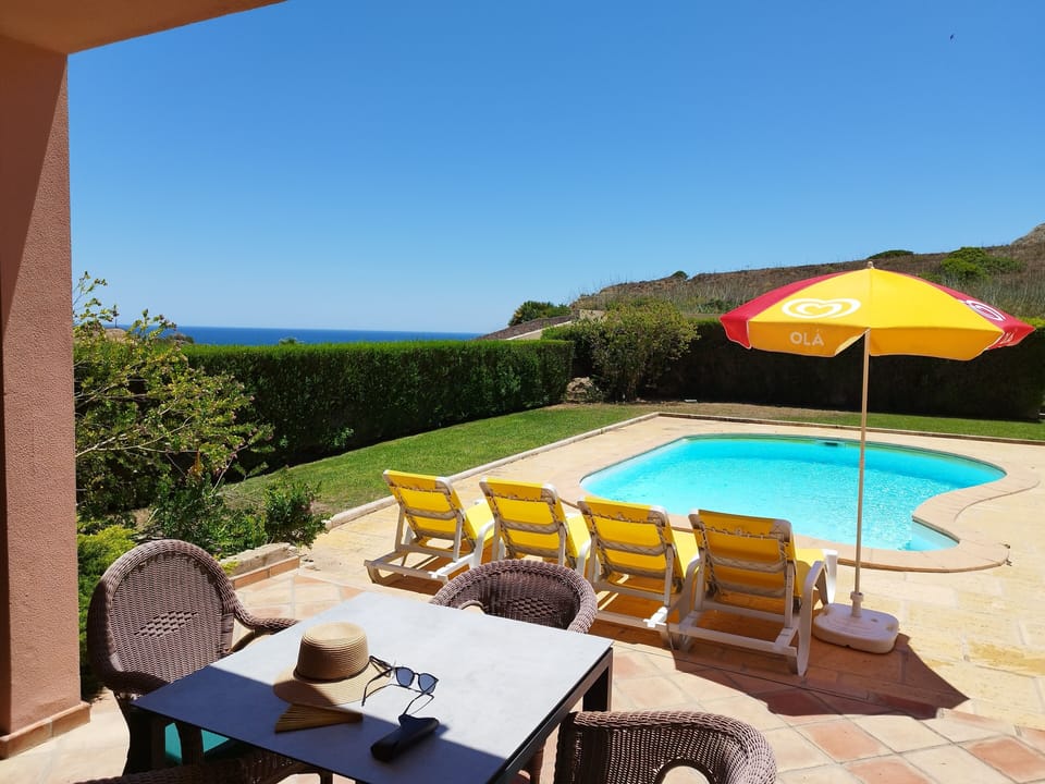 Veranda view of pool and clifftop coastal path in the Parque Naturel