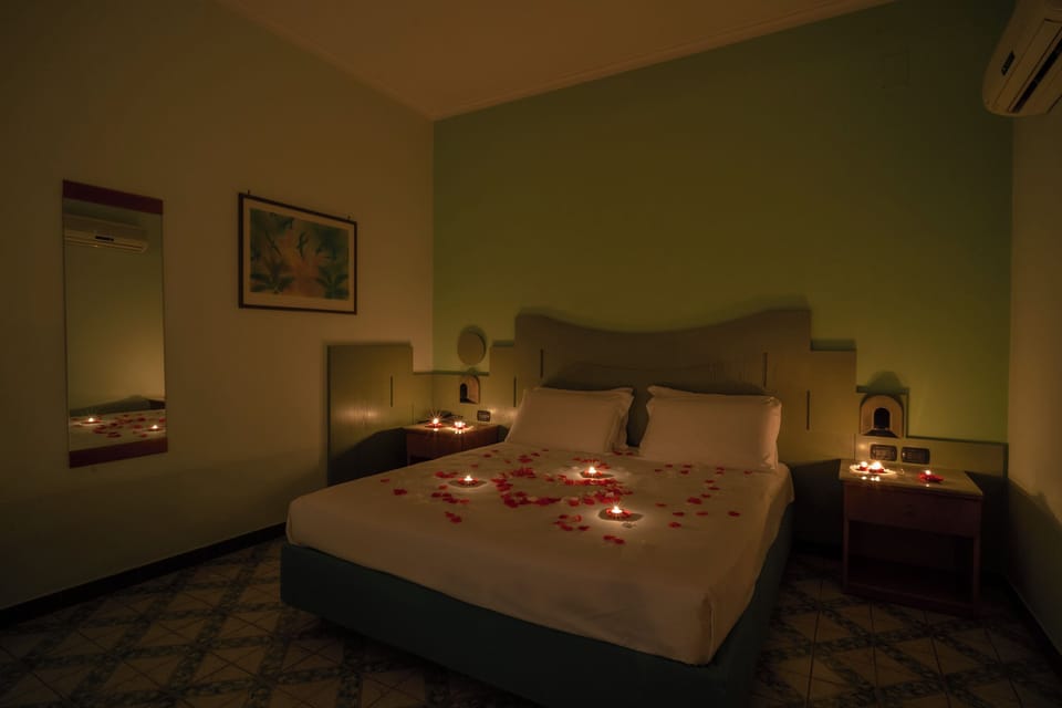 Family Room, Multiple Beds | Premium bedding, minibar, in-room safe, desk