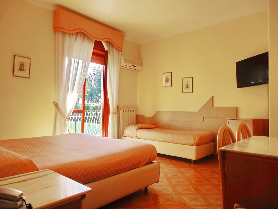Triple Room | Premium bedding, minibar, in-room safe, desk