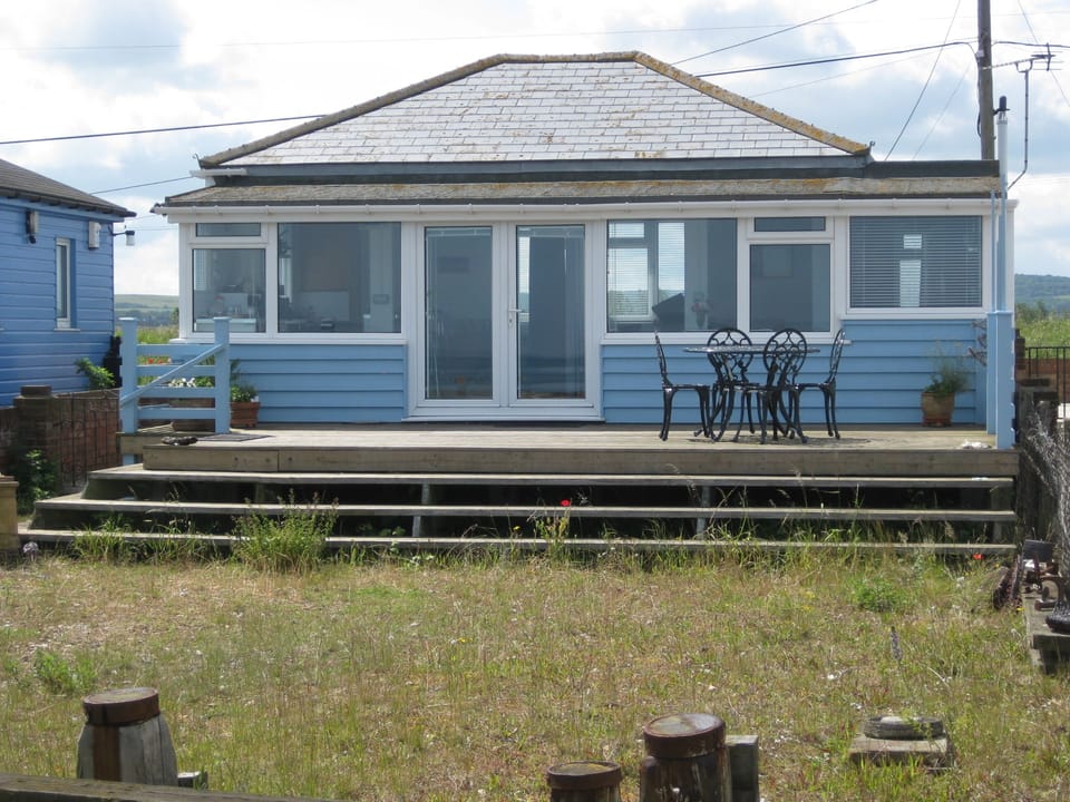 Beach Retreat faces the sea with its own  wild beach garden.