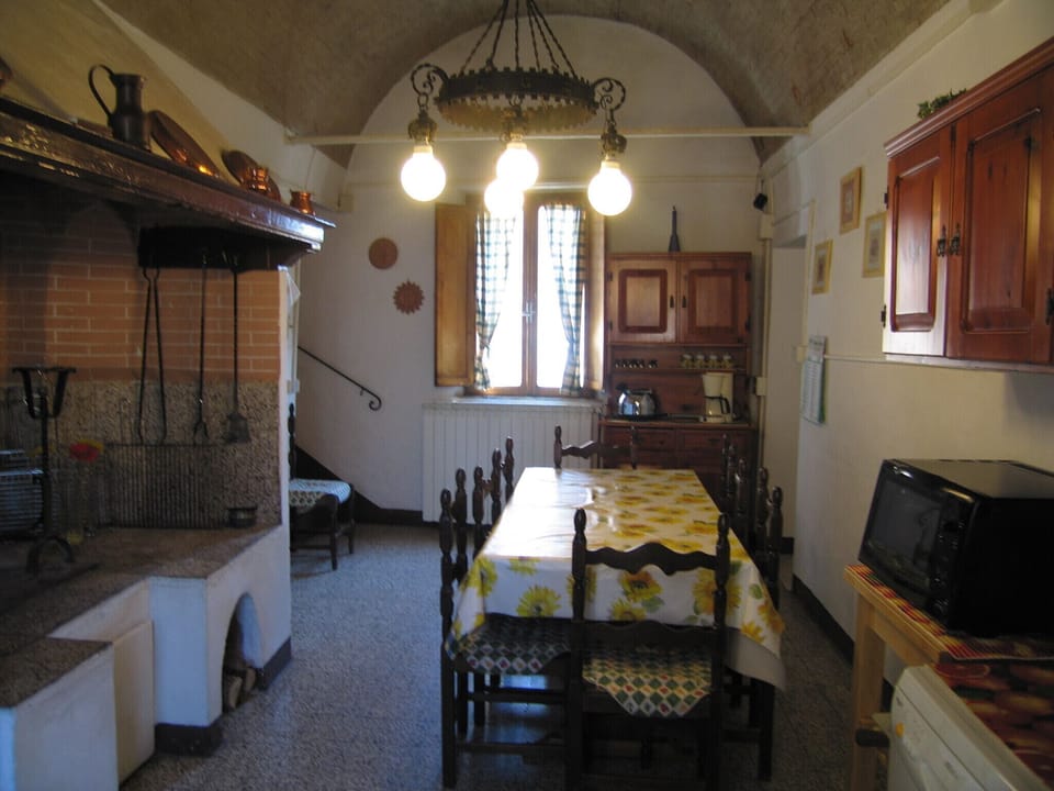 Kitchen with fireplace in use