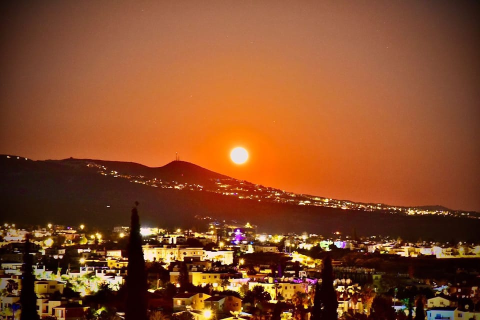 The moon, one evening in May, from the pool terrace, towards mountain

