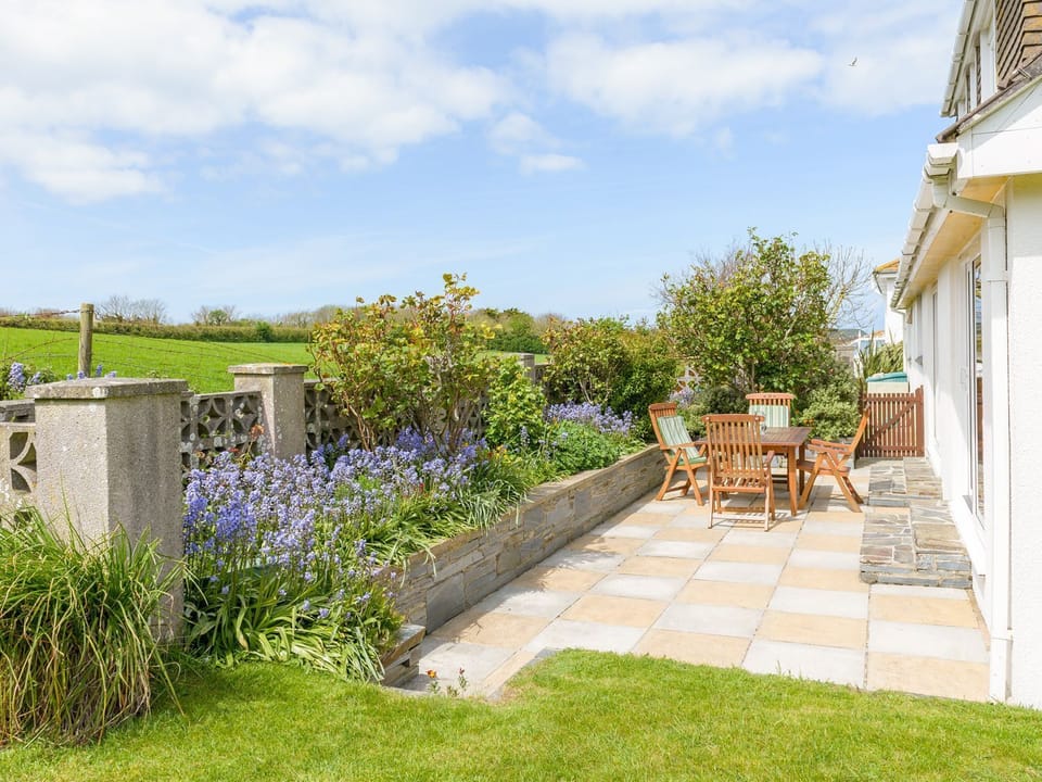 Sunny Patio  with dining table and loungers