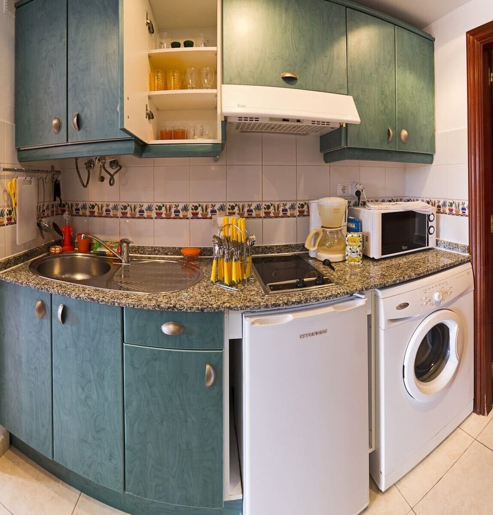 Kitchen with washing machine
