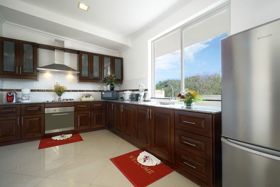 Fully equipped kitchen with complementary drinking water.