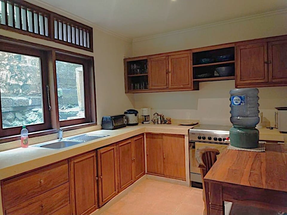 Exclusive Villa | Private kitchen | Fridge, microwave, oven, electric kettle
