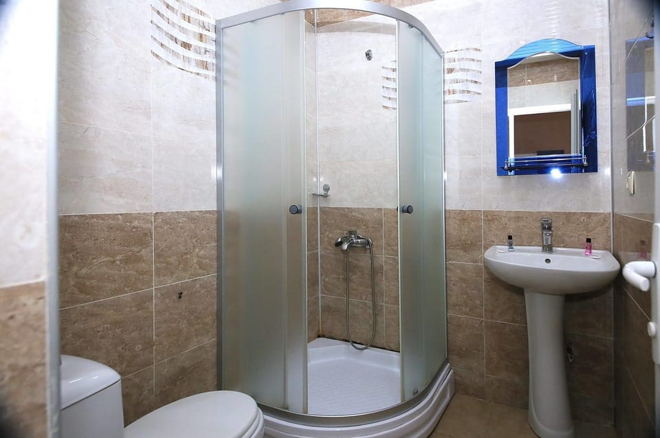 Shower, hair dryer, slippers