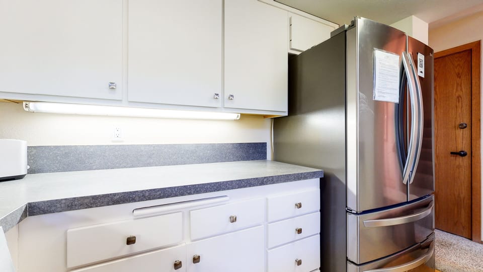 Condo, 2 Bedrooms | Private kitchen | Fridge, microwave, dishwasher, coffee/tea maker