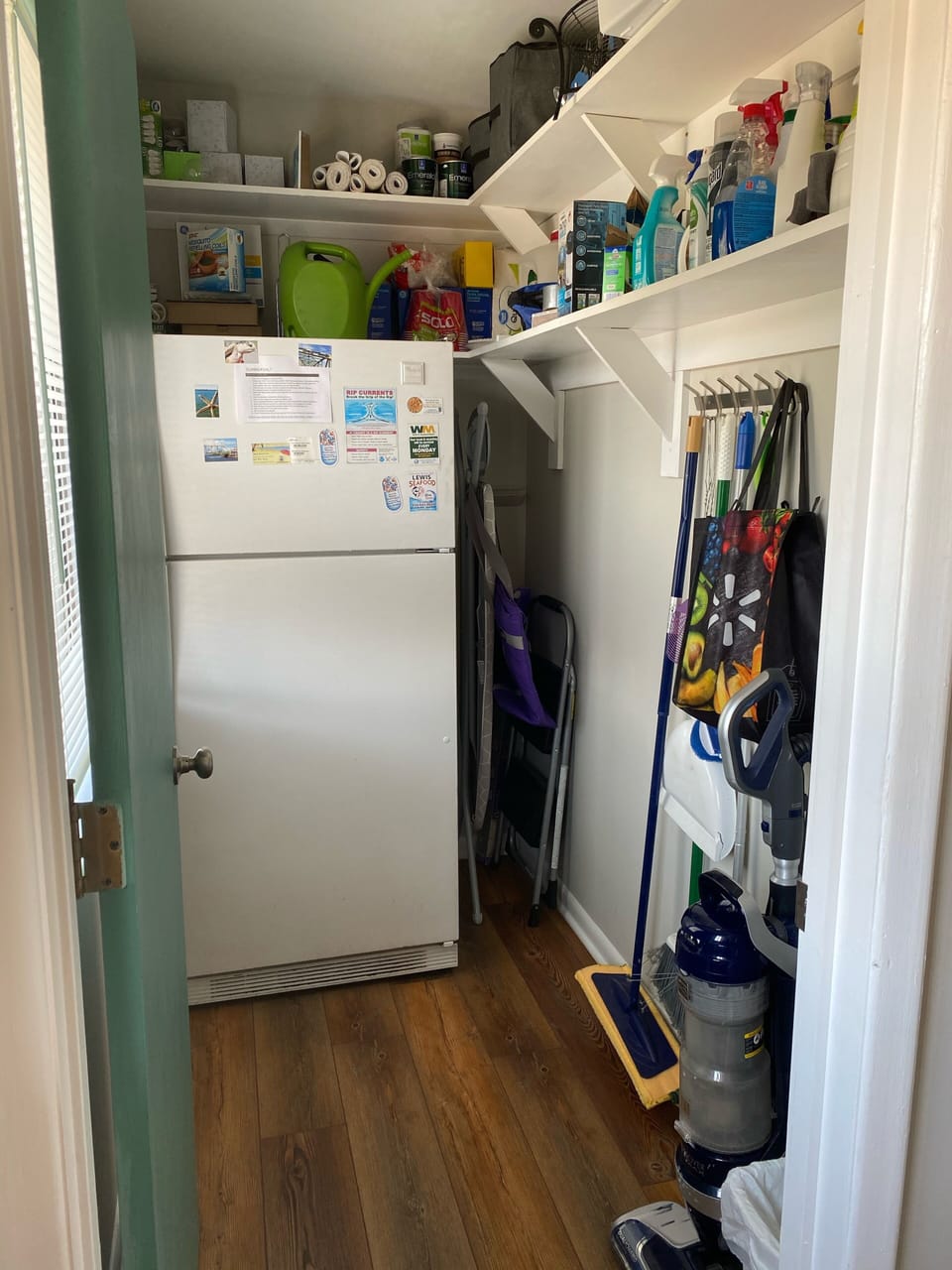 Extra refrigerator and cleaning supplies for unexpected messes. 