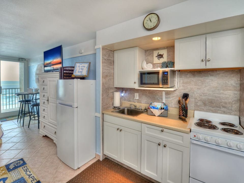 Full Kitchen (or Kitchenette)! Save on dining.