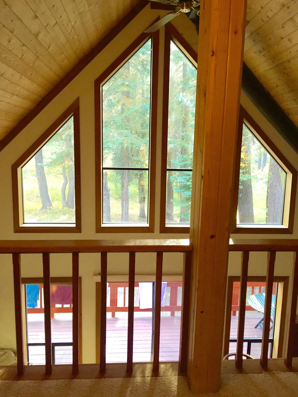 View from second story loft. With futon and second TV