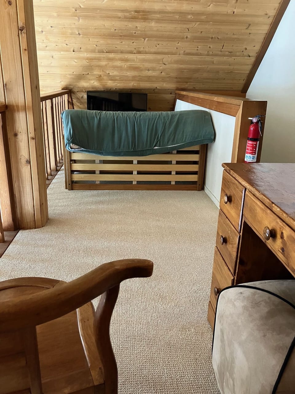 Loft area, with futon and second TV. Great kid hanghout
