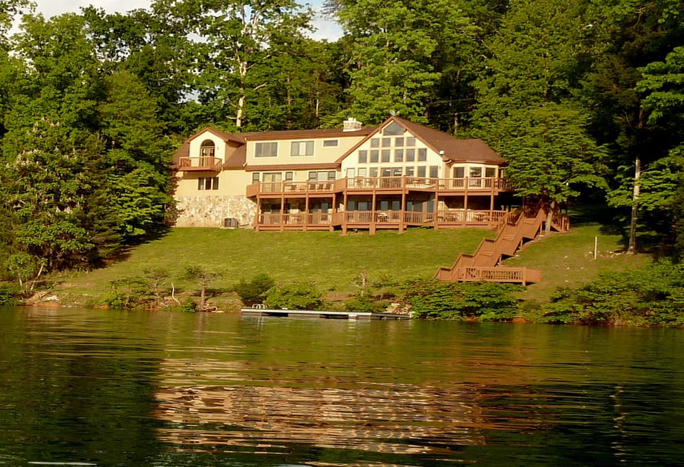 Norris Lake sunset light on home before the addition of the added new dock.