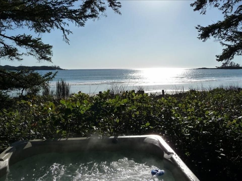 Watch summer sunset from our hot tub.