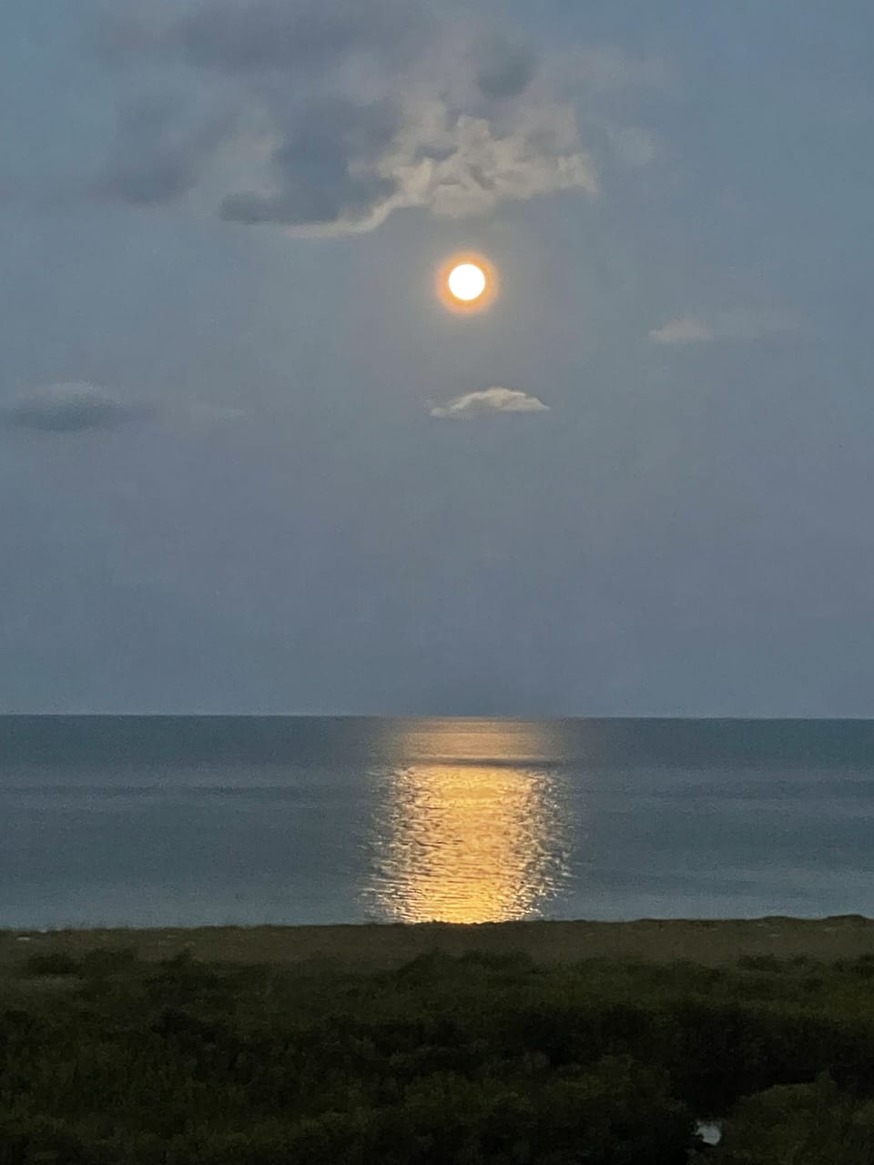 Moon shining over the Gulf of Mexico, view from our bedroom 