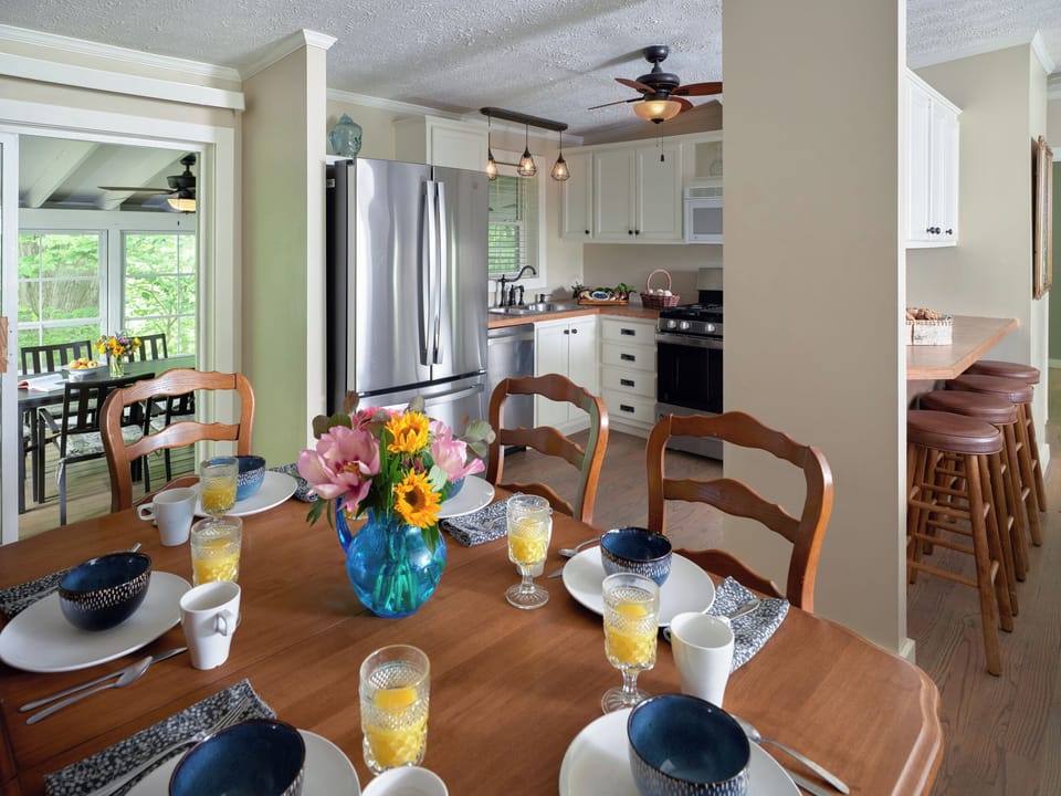 Dining room opens to screen porch and kitchen. 