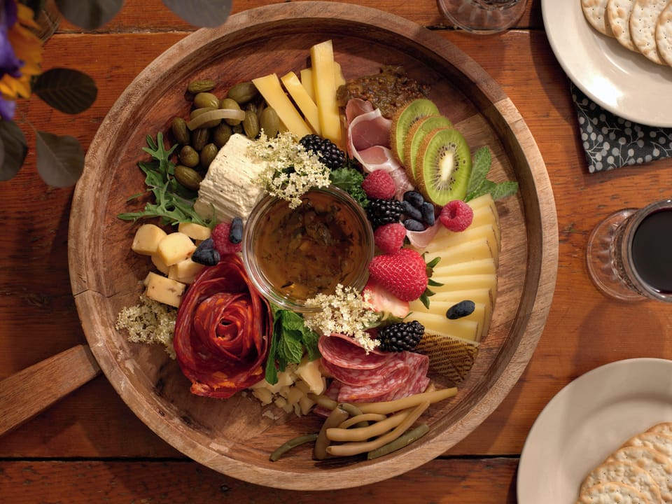 Custom charcuterie boards can be added to stays, along with local wine.