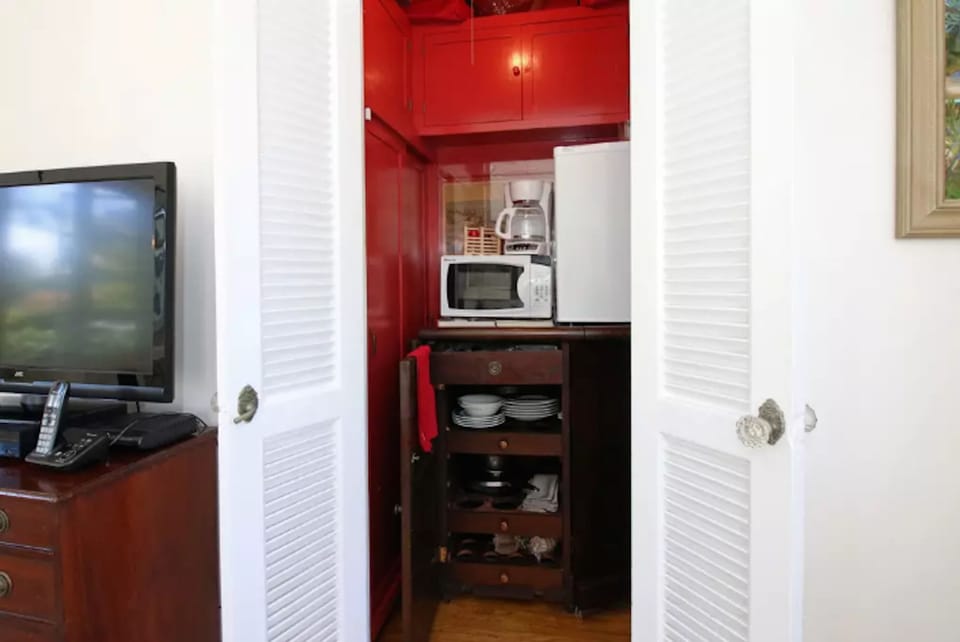 The kitchenette has a mini refrigerator, microwave, coffee maker, utensils, etc.