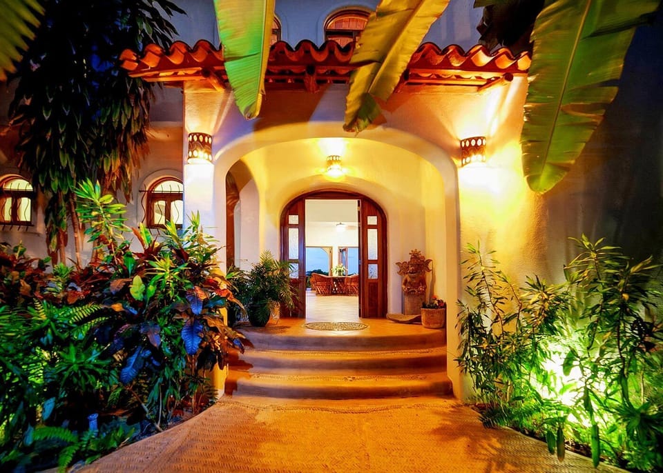 The entrance to the Lower Level, surrounded by our lush, tropical gardens.