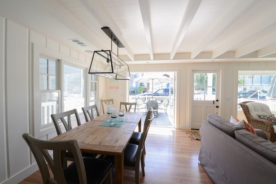 Dining table opens to seat 10. French doors open to patio and outside table. BBQ