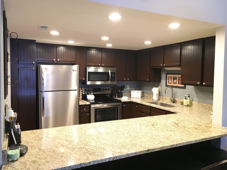 Fully stocked kitchen w/full-size appliances, pots, pans, blender, spices, etc.