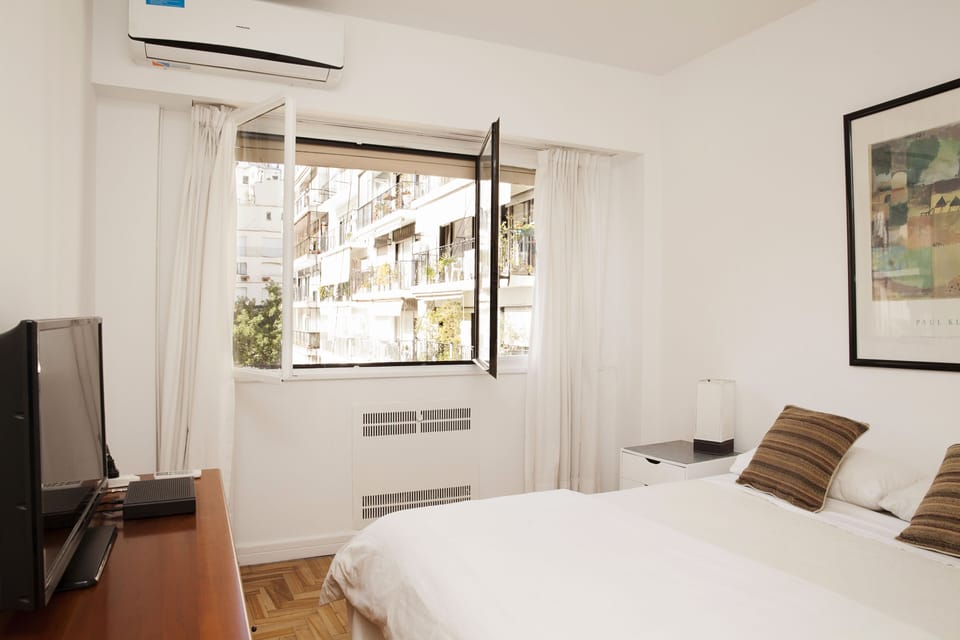 Motorized shutters provide for a dark and quiet evening.