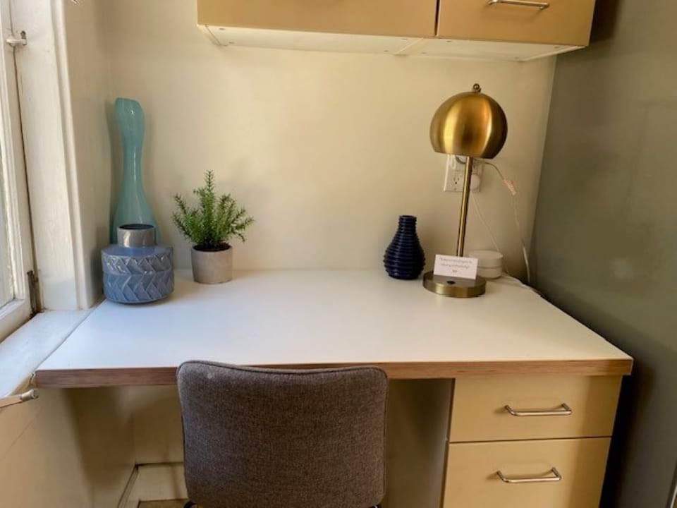 Kitchen desk area with window to backyard.