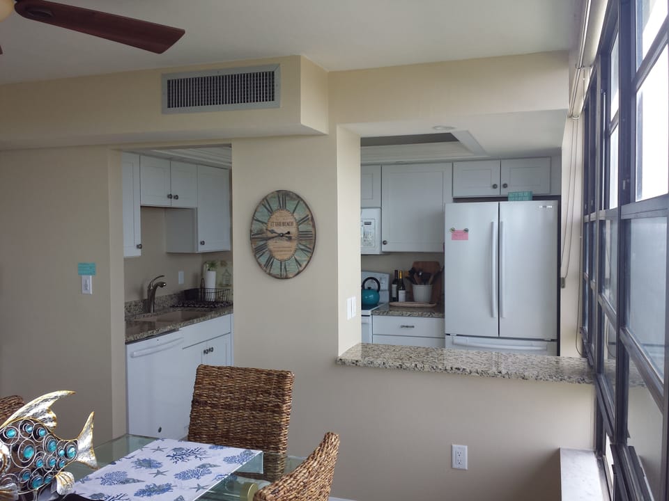 Dining to kitchen with wall opened for pass through and greater view!