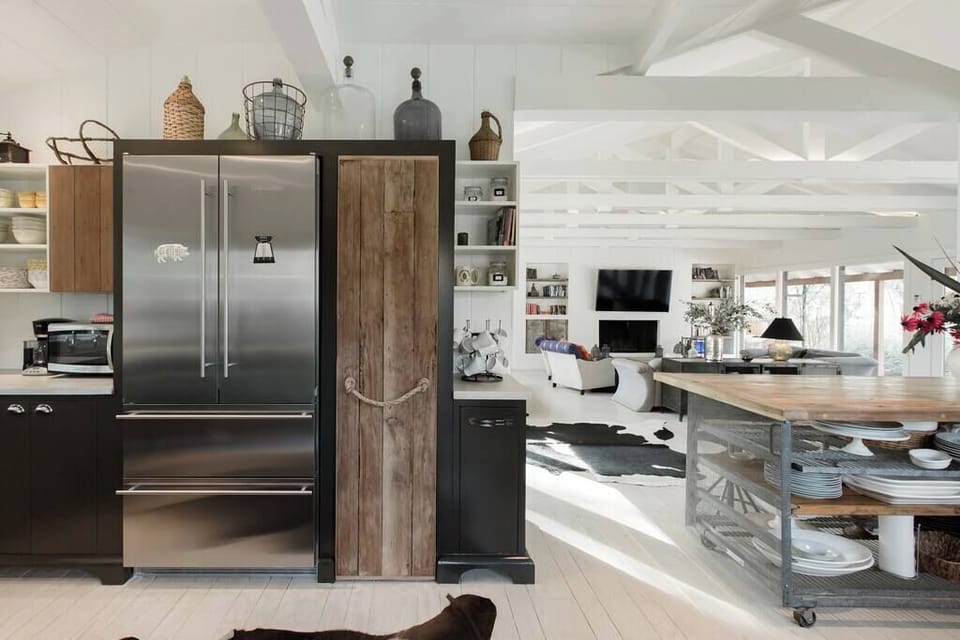Kitchen with open floor plan with living and dining