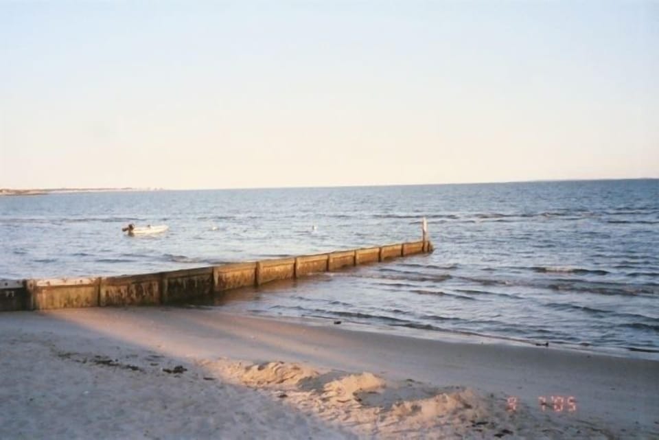 Mid-tide view of jetty  to East, at West Beach, foot of Post Ave.